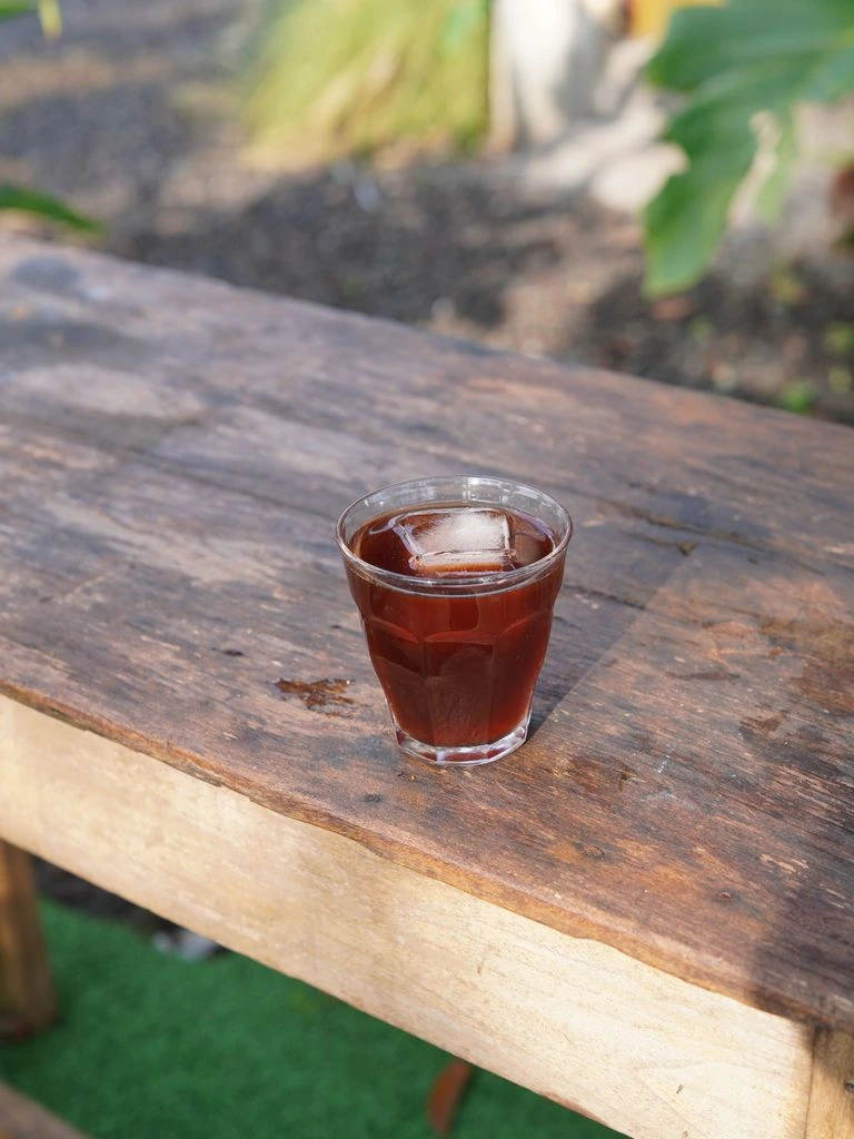 Cold brew coffee can with paper label on marble